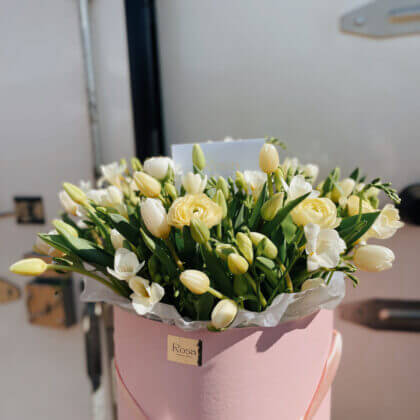 100 tulips in a pink box- one week lead time required to import