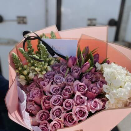 Unique Purple arrangement- 1 business day lead time required to import