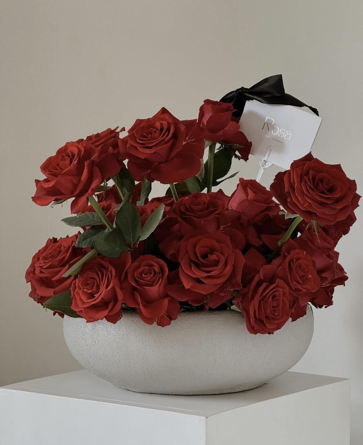 Lush red roses includes clay pot - 60 stems - Rosa Bespoke Flowers