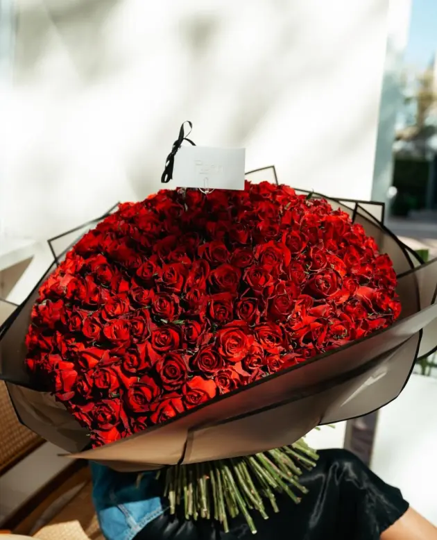 300 red roses in black wrapping - Rosa Bespoke Flowers
