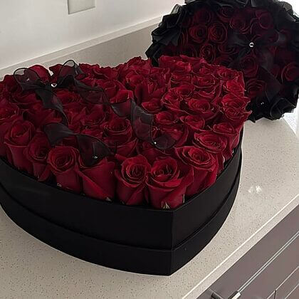 80 red roses in a black suede heart boxes