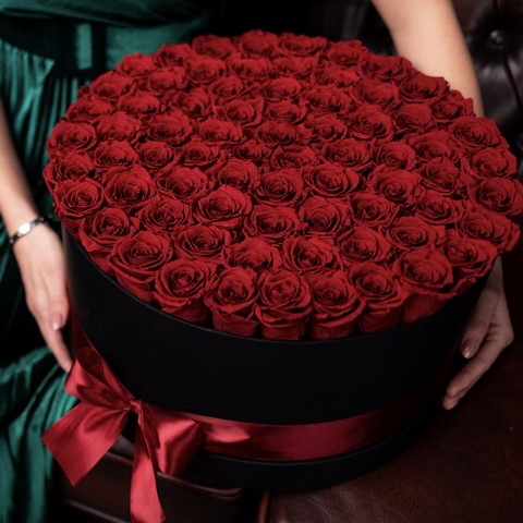 100 Red roses in black suede box